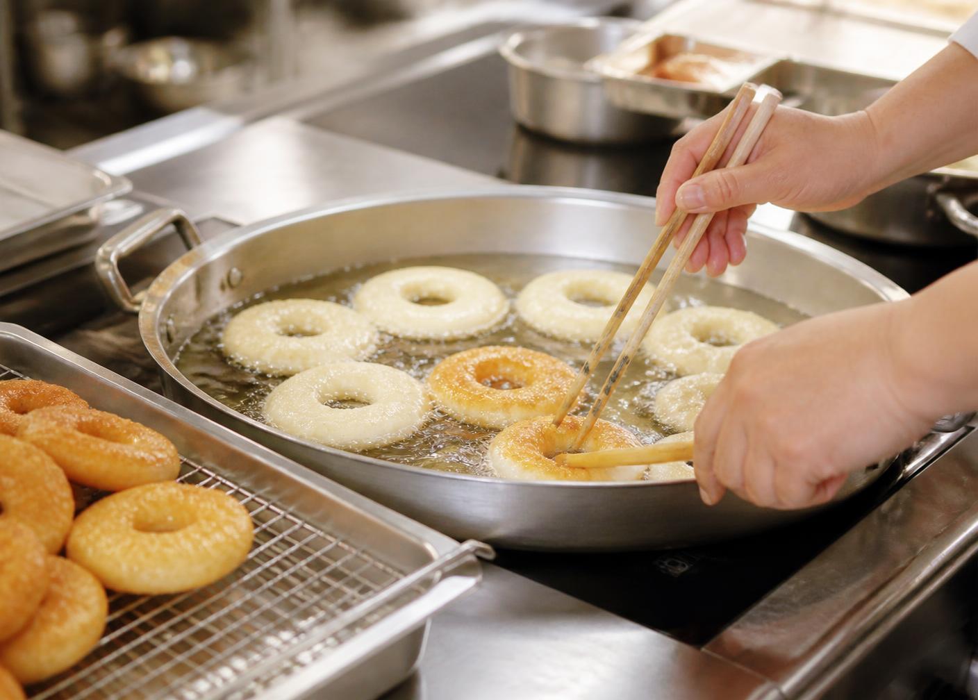 A batch of sweets being prepared in a commercial kitchen